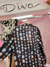 Load image into Gallery viewer, oohlala girls sheer button-down blouse with a geometric print in blue, peach, and white on a black background.
